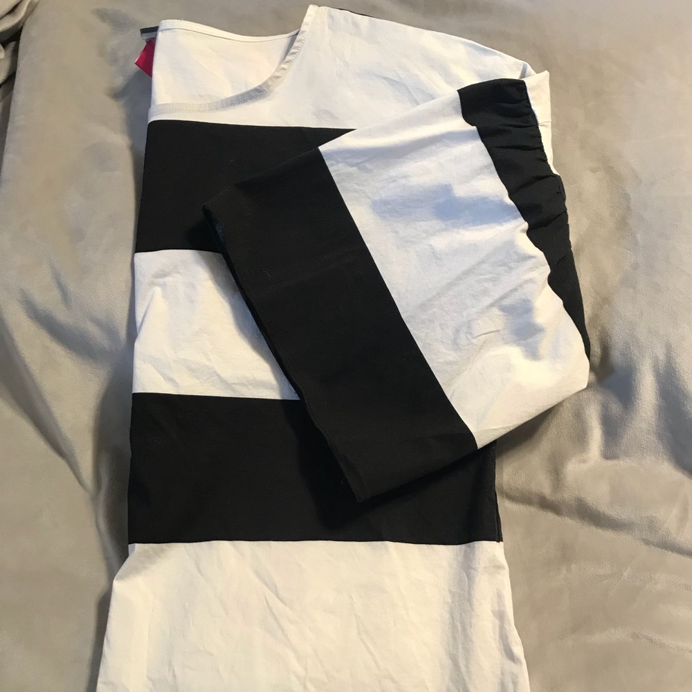 Short sleeve blouse with bell sleeves.